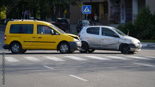 Traffic accident. Wrecked car. Car crash accident on street, damaged automobiles after collision in city. n