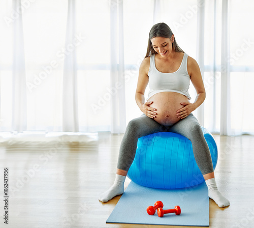 woman pregnant mother pregnancy female exercise sport fitness belly healthy maternity motherhood health yoga young ball photo