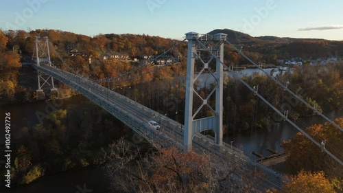 sunset flying clockwise around east side of Kingston Port Ewen Bridge