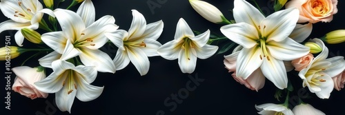 A close-up shot of a beautiful wreath of white lilies and roses on a black background, decoration, loss