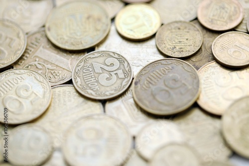 Big pile of different coins from various time period in Ukraine. Shiny Ukrainian money background