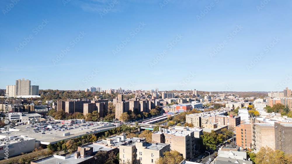 This location in the Bronx offers stunning views of lush greenery, a picturesque lake, and urban structures. Framed by the river, it showcases iconic bridges and the New York City skyline in the dista This location in the Bronx offers stunning views of lush greenery, a picturesque lake, and urban structures. Framed by the river, it showcases iconic bridges and the New York City skyline in the dista