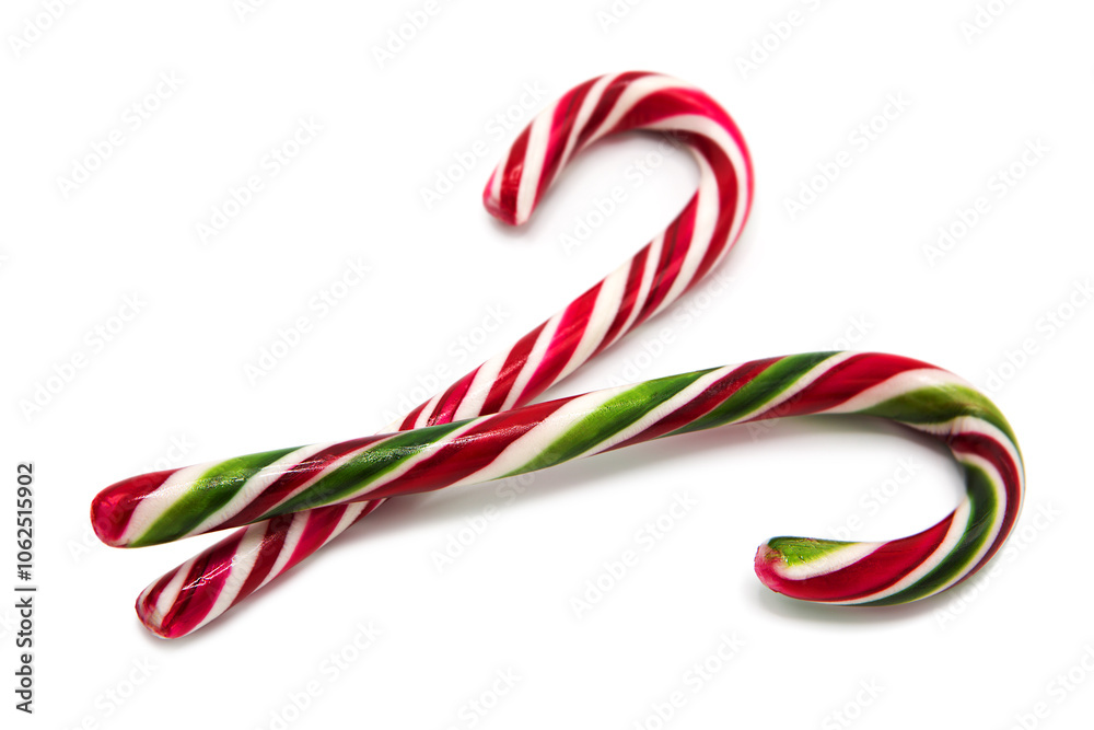 Classic glossy christmas candy cane lollipop isolated on white background. Kids festive sweets and treats. Symbol of gifts for the winter holidays. Classic glossy christmas candy cane lollipop isolated on white background. Kids festive sweets and treats. Symbol of gifts for the winter holidays.