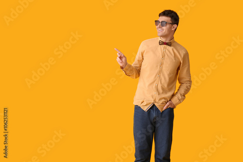 Young man with stylish bow ...