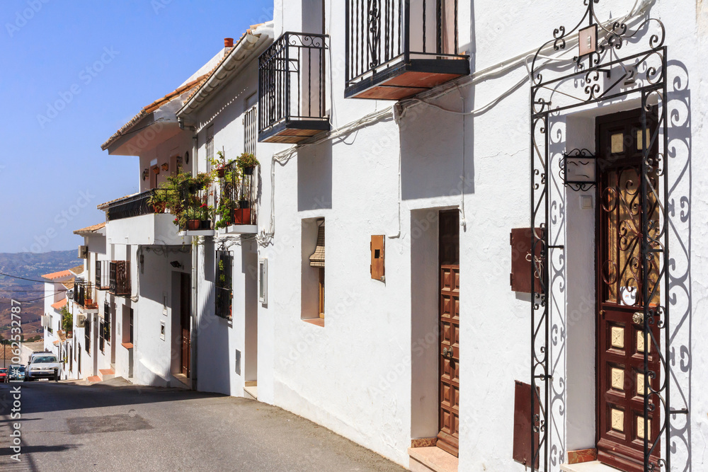 Fototapeta premium Typical hilly street in Mijas