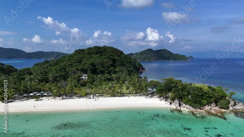 Idyllic Aerial View of Tropical Island with White Sand, Clear Waters, Lush Greenery, Palms, and Boats – High-Resolution Drone Footage, Philippines