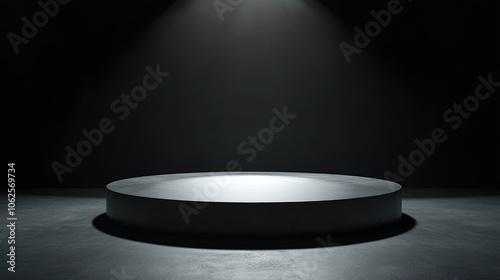 A Circular Platform Illuminated by a Single Spot Light in a Dark Room
