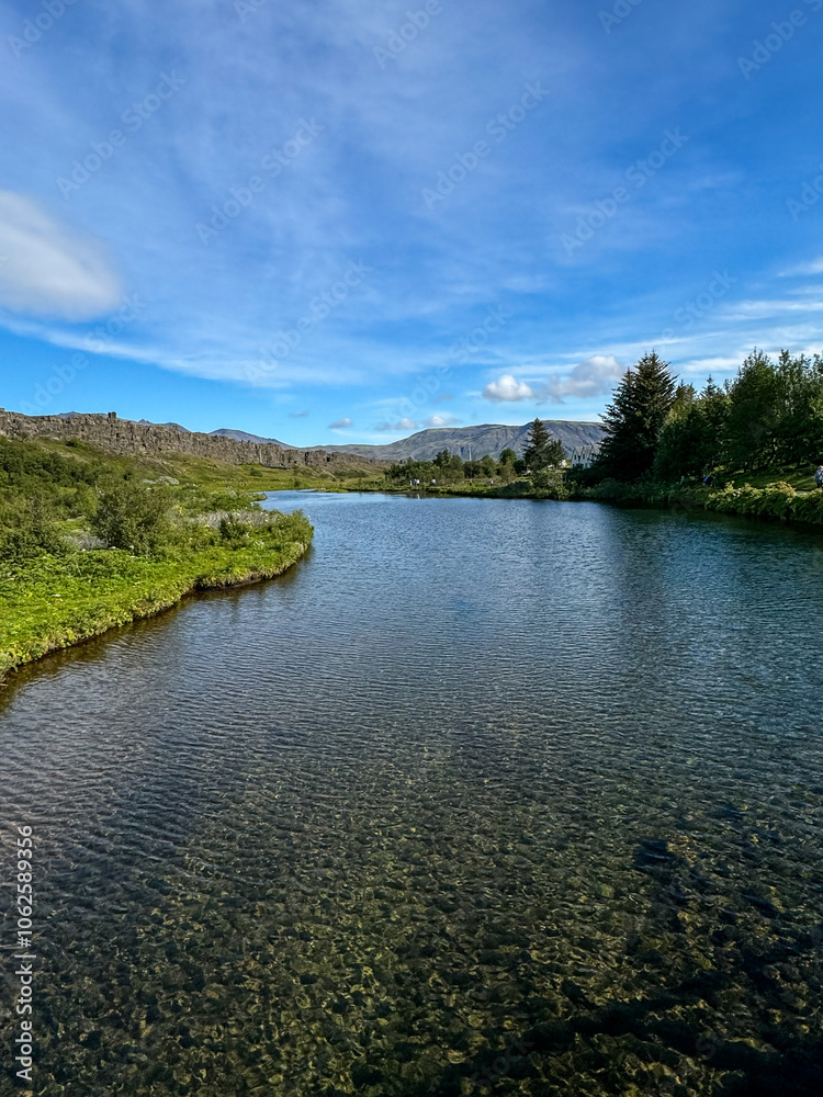 Thingvellir, Iceland - August 12, 2024: Landscape views of the continental divide in Thingvellir National Park in Iceland
Thingvellir, Iceland - August 12, 2024: Landscape views of the continental divide in Thingvellir National Park in Iceland
