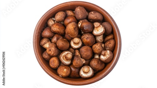 Top view of champignon mushrooms in a bowl, isolated on white