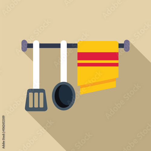 Kitchen towel and utensils hanging on a rack, creating a cozy and organized culinary space