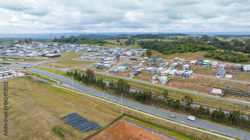 Photography Drone aerial photograph of construction and infrastructure development in the fast growing suburb of Oran Park in the high density development region of western Sydney, NSW Australia