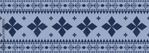 Ethnic abstract geometric pattern ,Thai stye on blue background. Design for clothing, fabric, background, wallpaper, wrapping, batik. Knitwear, Embroidery style. Aztec geometric art ornament ,tribal
