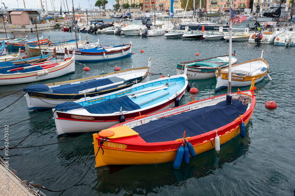 Traditional colorful fishing boats, called pointu in French. in Nice Port, Nice, France on sunny summer day. Traditional colorful fishing boats, called pointu in French. in Nice Port, Nice, France on sunny summer day.