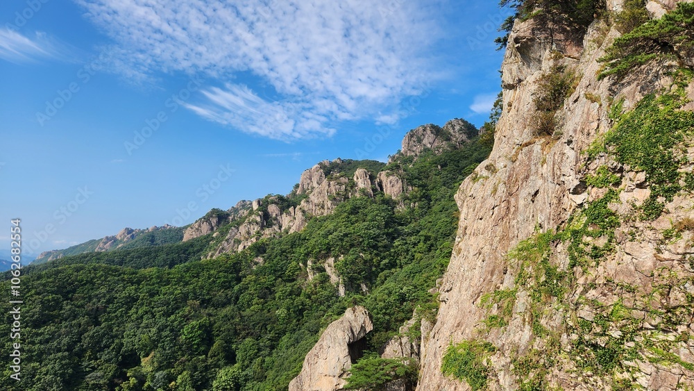 Fototapeta premium Beautiful scenic view of Daedunsan mountain with rocky mountains, South Korea. Hiking in Korea. Healthy Lifestyle and Hobbies