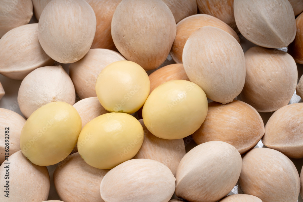 Close up Fresh Ginkgo, Ginkgo seeds in wooden basket on wooden table.