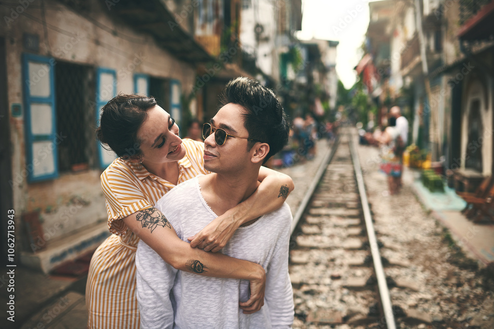 Happy, hug and couple in city for vacation, sightseeing and holiday for romance in relationship. Sunglasses, love and woman hug man for bonding together in urban town for weekend trip in Vietnam. Happy, hug and couple in city for vacation, sightseeing and holiday for romance in relationship. Sunglasses, love and woman hug man for bonding together in urban town for weekend trip in Vietnam.