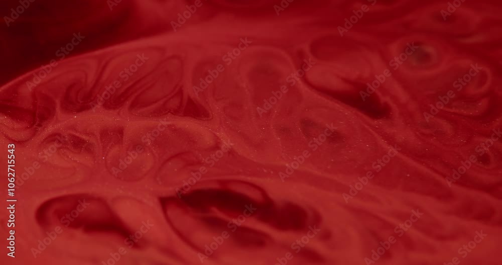 Marble spill. Paint flow. Red smooth wide stream stone effect with dissolving dye in opaque liquid. Wavy gleam glitter enamel morphing emulsion.