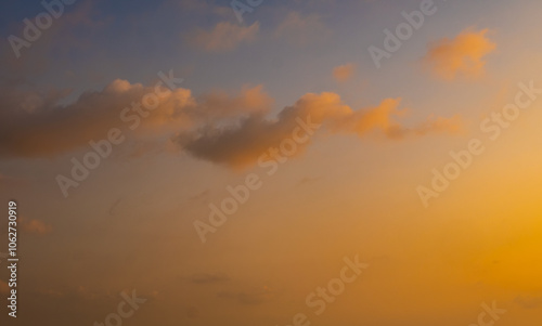 Enjoy a panoramic view of the skyline. The sun rises in the morning sky with colorful clouds. and beautiful cloud patterns In the soft light of the mornin