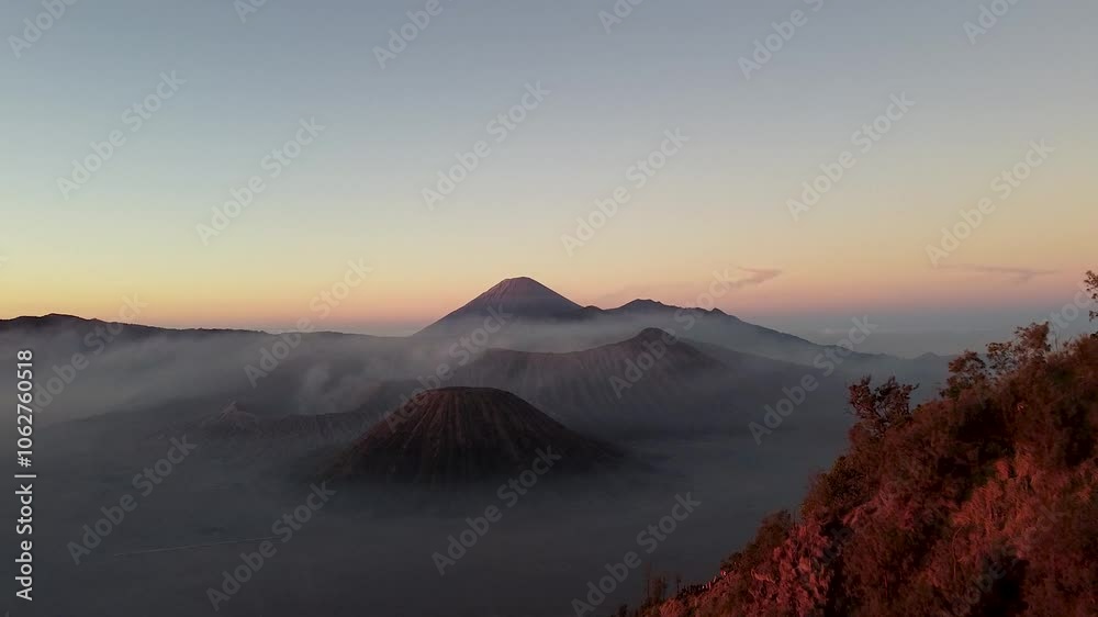 Misty sunrise over Mount Bromo, Java, Indonesia Misty sunrise over Mount Bromo, Java, Indonesia