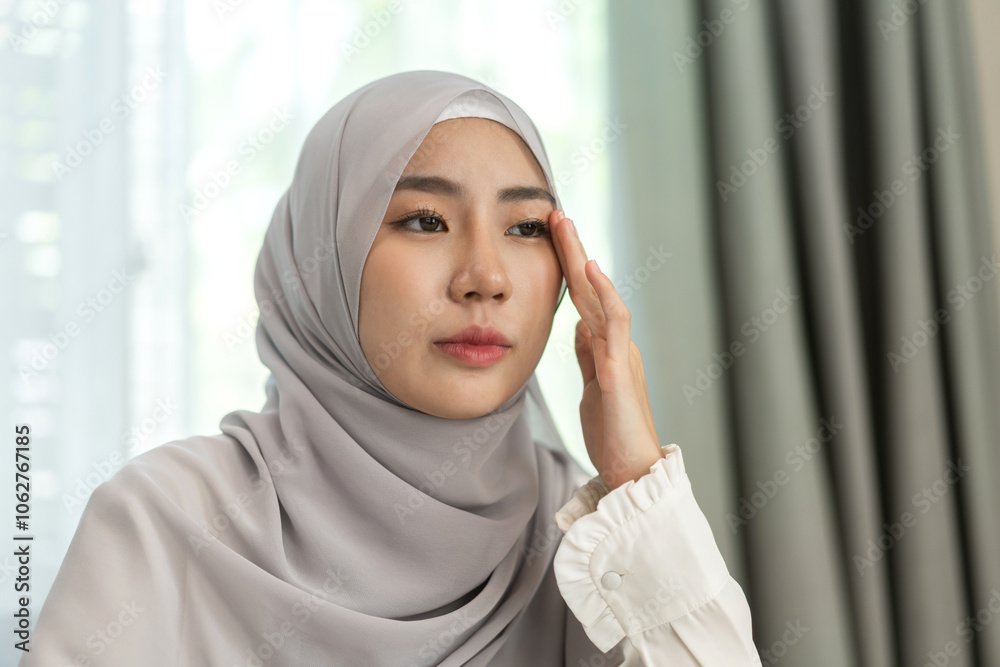 Young muslim woman in hijab experiencing stress and fatigue, headache, expressing emotions, mental health concept, sick, psychological wellbeing, personal reflection, diseased and migraine Young muslim woman in hijab experiencing stress and fatigue, headache, expressing emotions, mental health concept, sick, psychological wellbeing, personal reflection, diseased and migraine