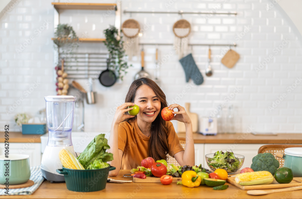 Portrait of beauty body slim healthy asian woman big smile cooking and preparing vegan food healthy holding apple, green apple, dental, teeth, fruit in kitchen at home.Diet.Fitness, healthy food Portrait of beauty body slim healthy asian woman big smile cooking and preparing vegan food healthy holding apple, green apple, dental, teeth, fruit in kitchen at home.Diet.Fitness, healthy food