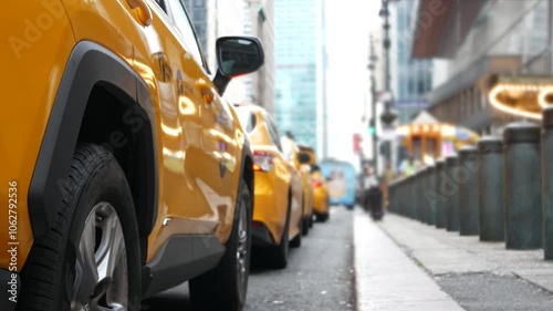 New York City Grand Central Terminal railway station, 42 street. Manhattan Midtown. Yellow taxi cab row, car transport on Pershing Square, NYC, USA. American urban road traffic, people pedestrians.