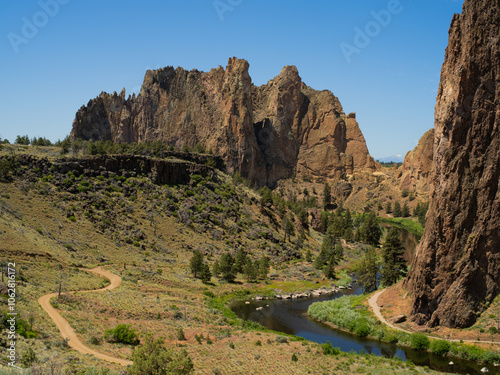 A mountain range with a river running through it photo