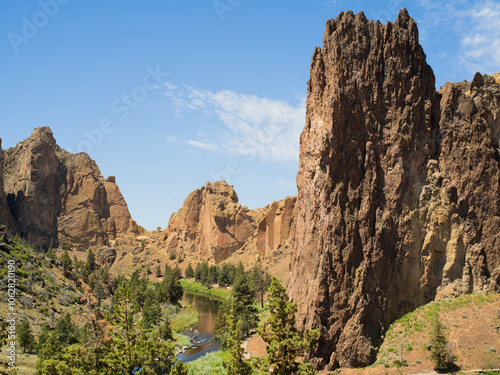 A mountain range with a river running through it photo