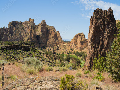 A mountain range with a river running through it photo