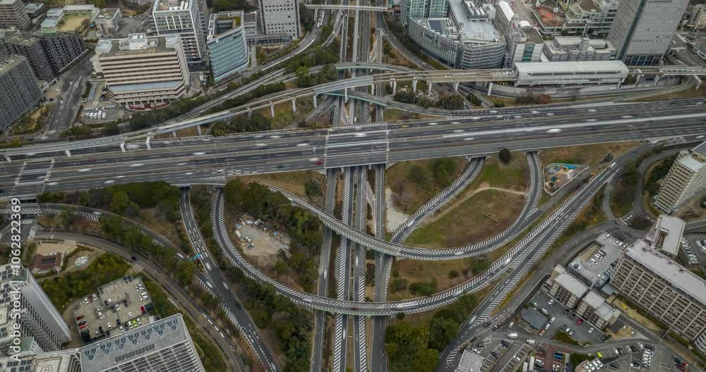 Tilt down day timelapse of highway crossing in Japan, Osaka Tilt down day timelapse of highway crossing in Japan, Osaka