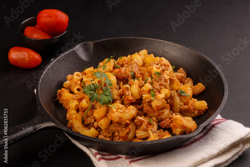 American Goulash or Slumgullion is an American Comfort Dish, Made From Elbow Pasta, Beef and Tomatoes.  photo