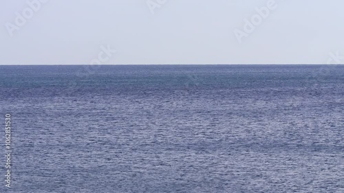 Still Ocean Surface on Calm Day. Calm Sea Surface with Subtle Waves