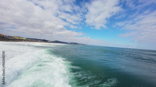 FPV Drone View of Surfable Beach in Pohang, South Korea photo