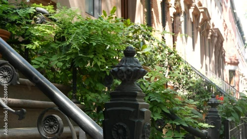 New York City townhouse building, Brooklyn Heights residential district, USA. Brownstone urban architecture, attached house. United States real estate, american property, apartments and homes in NYC.