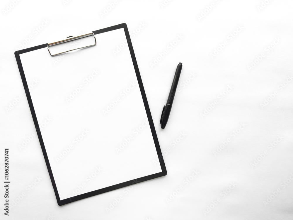 Minimalist clipboard with blank paper and pen on white background Minimalist clipboard with blank paper and pen on white background