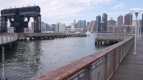 New York City waterfront skyline, Manhattan midtown, riverfront skyscrapers by East river water. Waterside cityscape view from Gantry Plaza dock pier, Long Island, Queens. United States architecture.