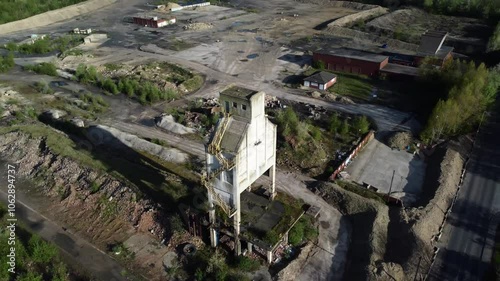 High ariel orbit of loading tower at abandoned Yorkshire industrial coking plant. photo