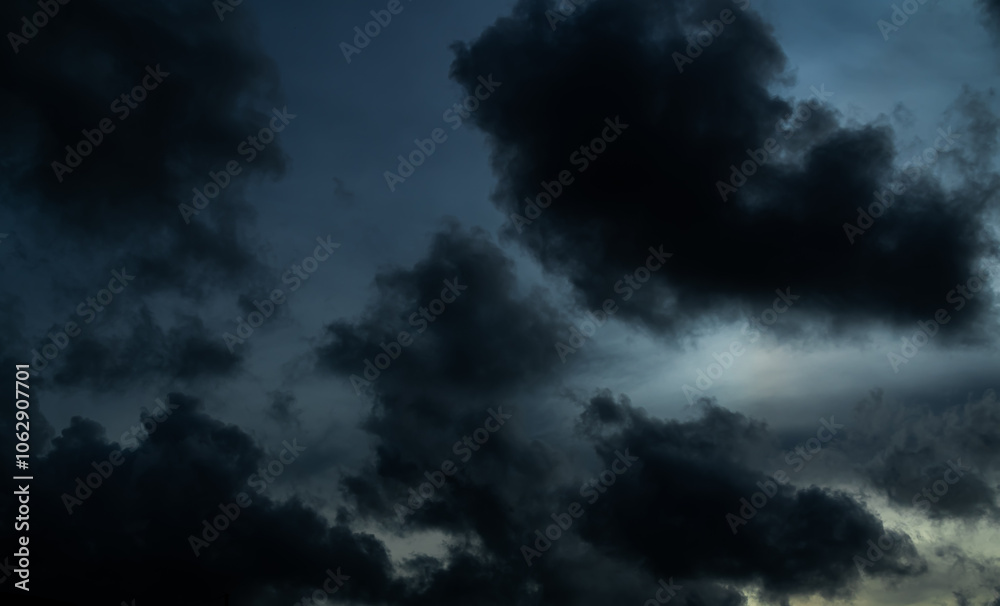 Fototapeta premium Cloud storm sky dark halloween background rain lightning thunder stoumy typhoon Nature light scene rainy atmosphere damage effect carbon dioxide dust air pollution 2.5 Pm, texture nature windstorm.