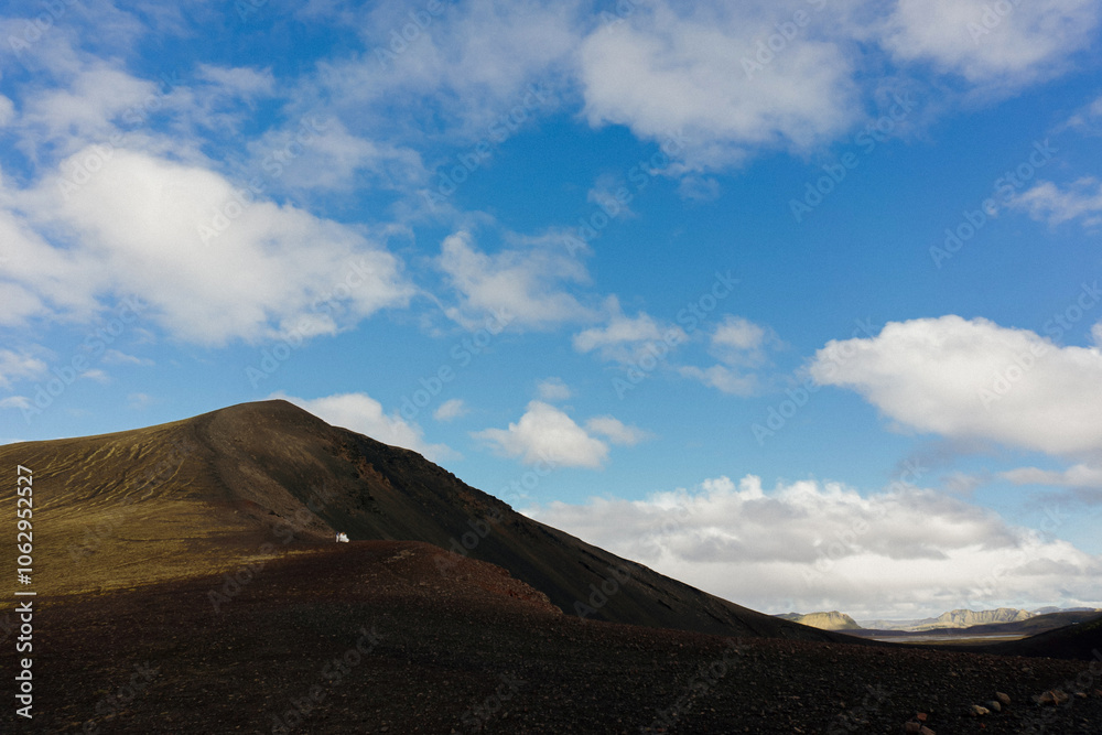 Wedding couple against mountains in Iceland Wedding couple against mountains in Iceland