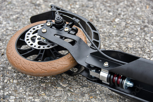 Scooter suspension with spring. Close-up.