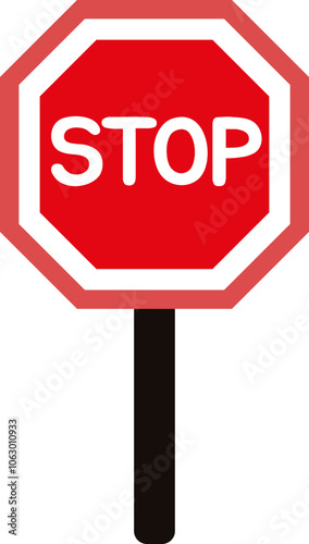 Red octagonal stop sign on the road signaling caution and safety