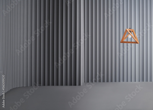 Decorative grey wall background and lamp concept, chair sofa and furniture design. Dark color floor.