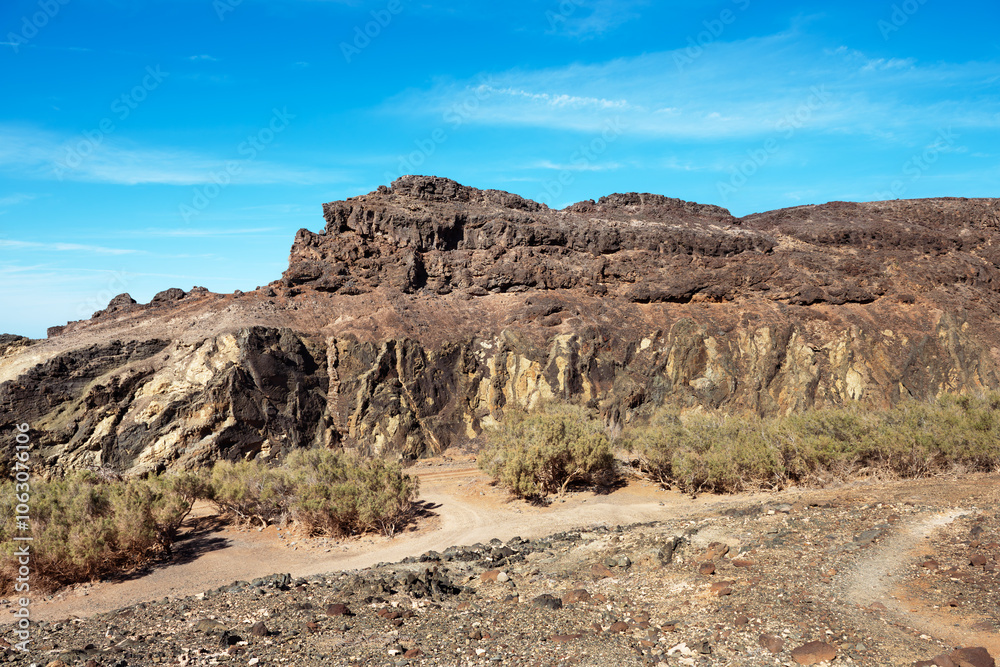 Mountains landscape with colors and structures of the rocks inland at the Pena Horadada beach. Ajuy, Fuerteventura, Canary Islands, Spain. Mountains landscape with colors and structures of the rocks inland at the Pena Horadada beach. Ajuy, Fuerteventura, Canary Islands, Spain.