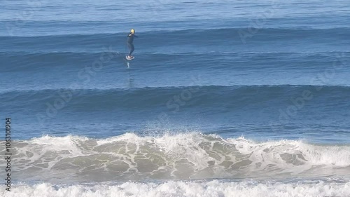 Surfing ocean sea waves board water sport wave riding in Portugal Europe photo