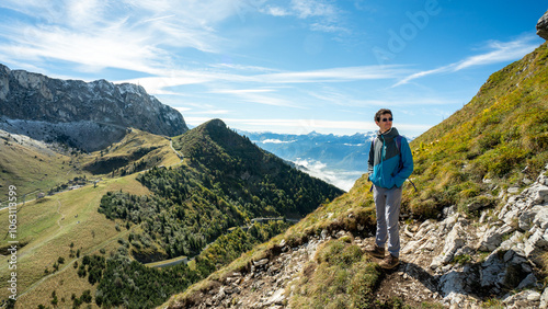 Man hiking in Dent de Jaman with sprawling alpine views