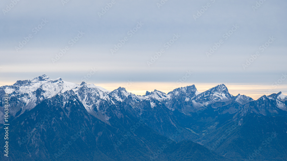 Majestic peaks of the Swiss Alps under a twilight sky Majestic peaks of the Swiss Alps under a twilight sky