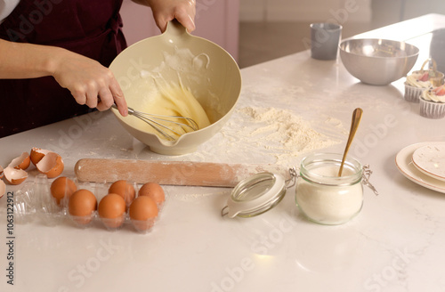 Baking essentials and techniques on kitchen counter photo