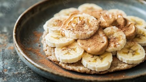 Rice cakes topped with almond butter and banana slices