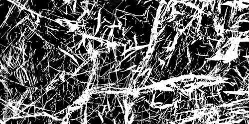 Abstract black white image with long and short intermittent liquid lines made by brush. Brushed metal spotted cracked abstract background grunge. Marble texture for decorative white background. 