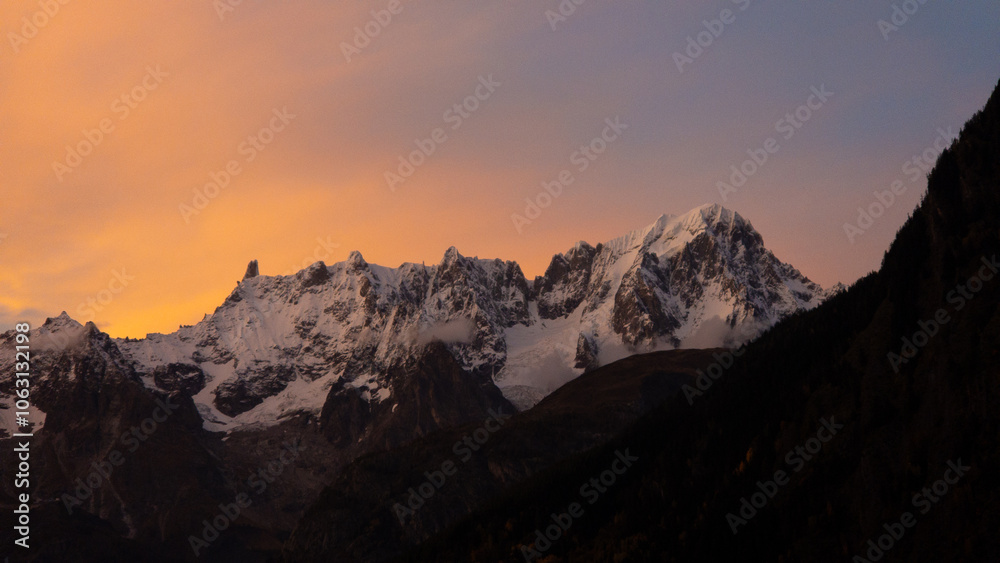 Sunset over Mountains covered in snow Sunset over Mountains covered in snow
